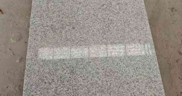 茂名芝麻白光面毛板