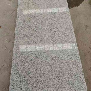 茂名芝麻白光面毛板